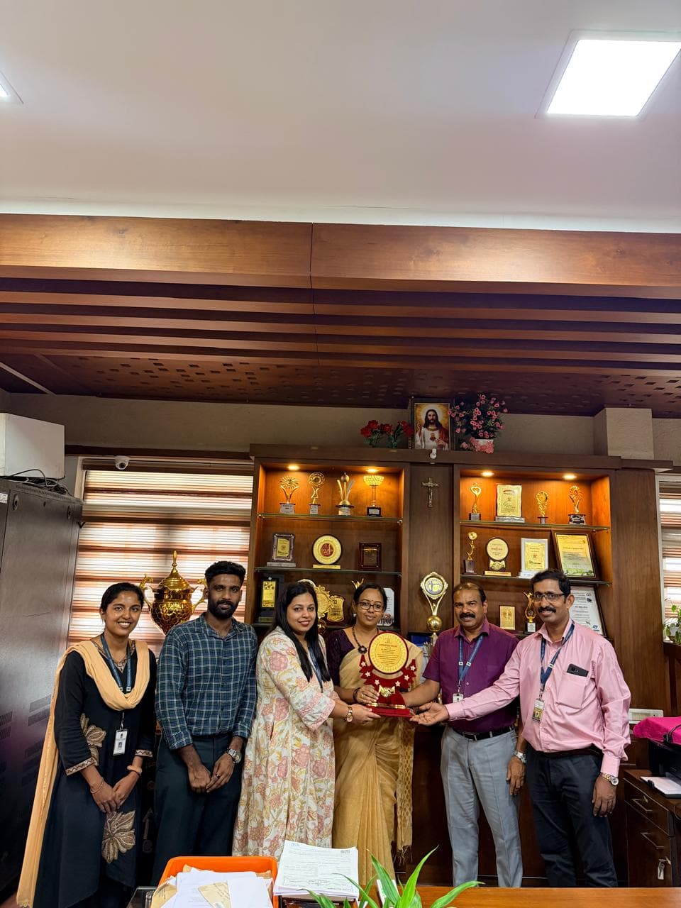 Future Optima IT Solutions and Bharata Mata College representatives at the MoU signing ceremony